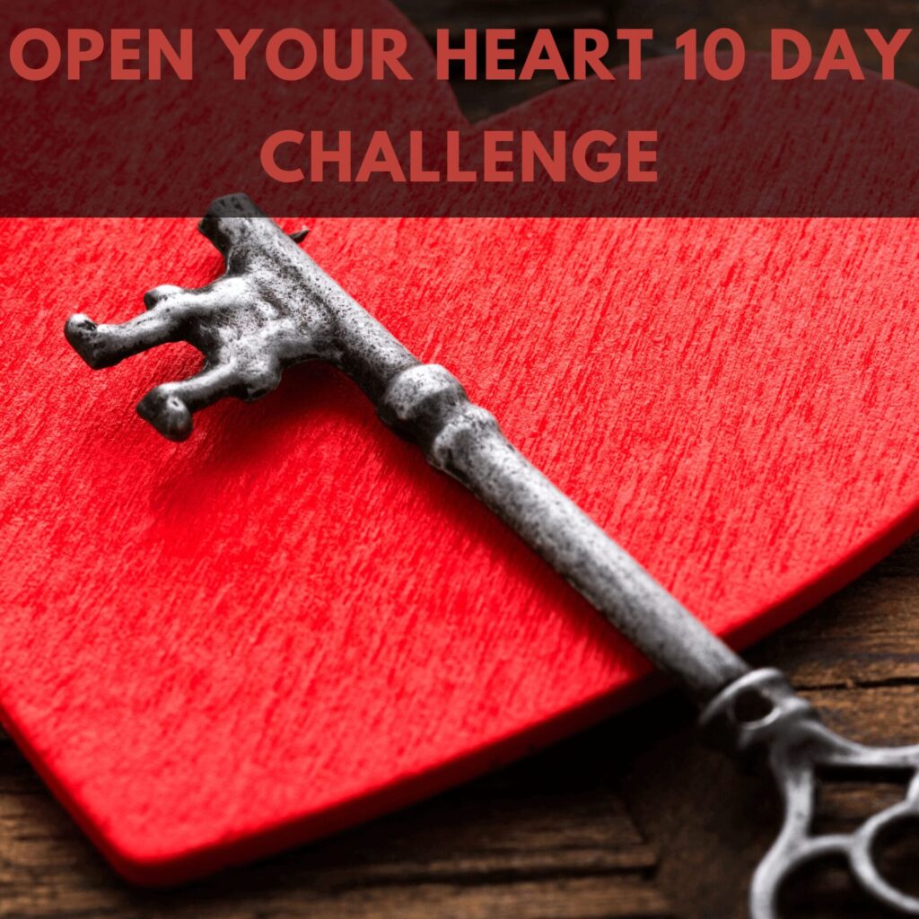 A photo of a key sitting on a heart with the caption "Open your heart challenge"